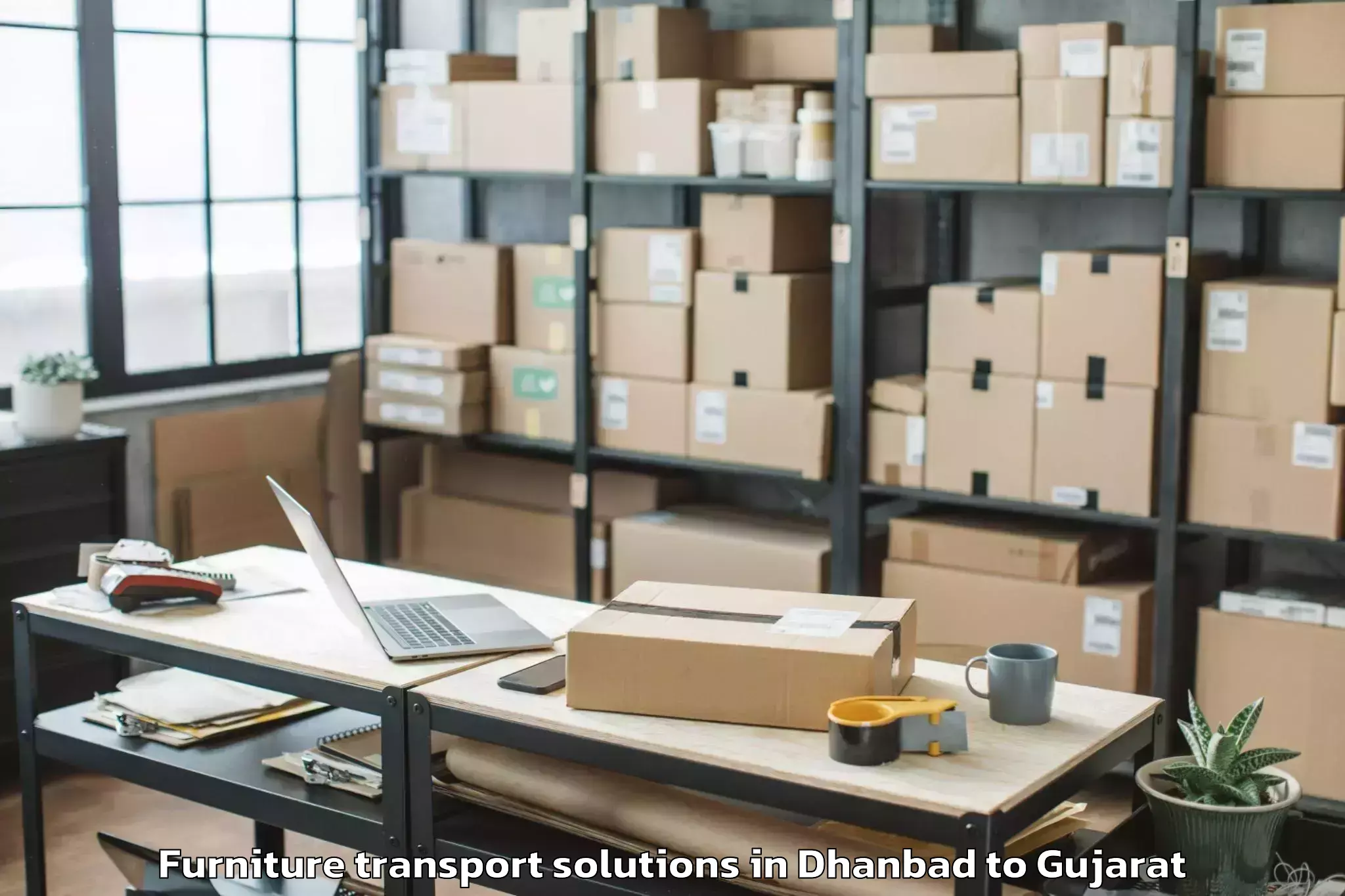 Get Dhanbad to Vaghodia Furniture Transport Solutions